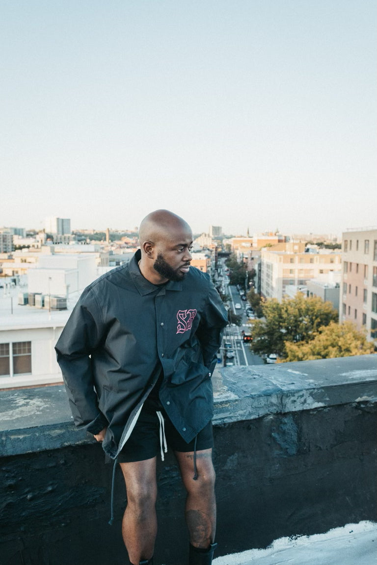 EVOLVE OR DISSOLVE COACHES JACKET