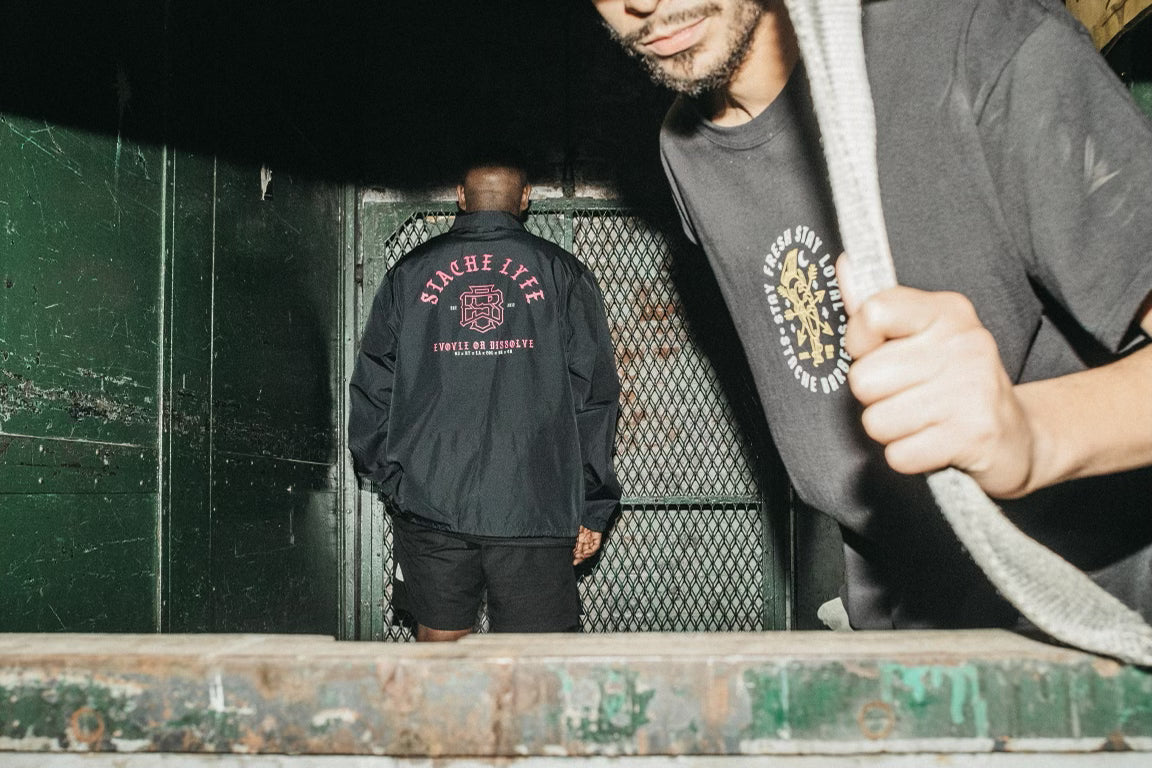 EVOLVE OR DISSOLVE COACHES JACKET