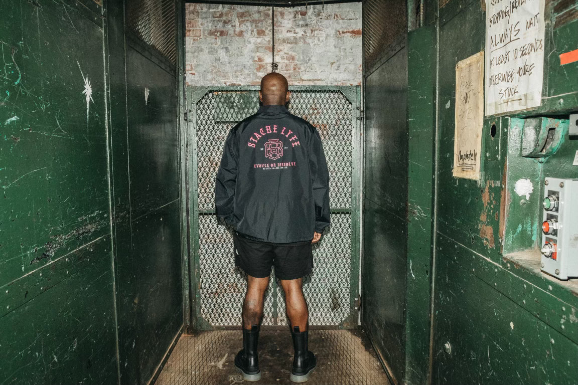 EVOLVE OR DISSOLVE COACHES JACKET